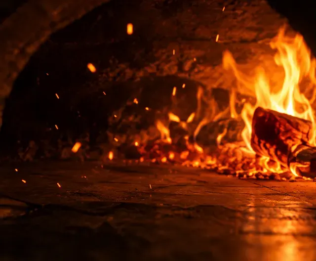 Oak logs burning in the oven